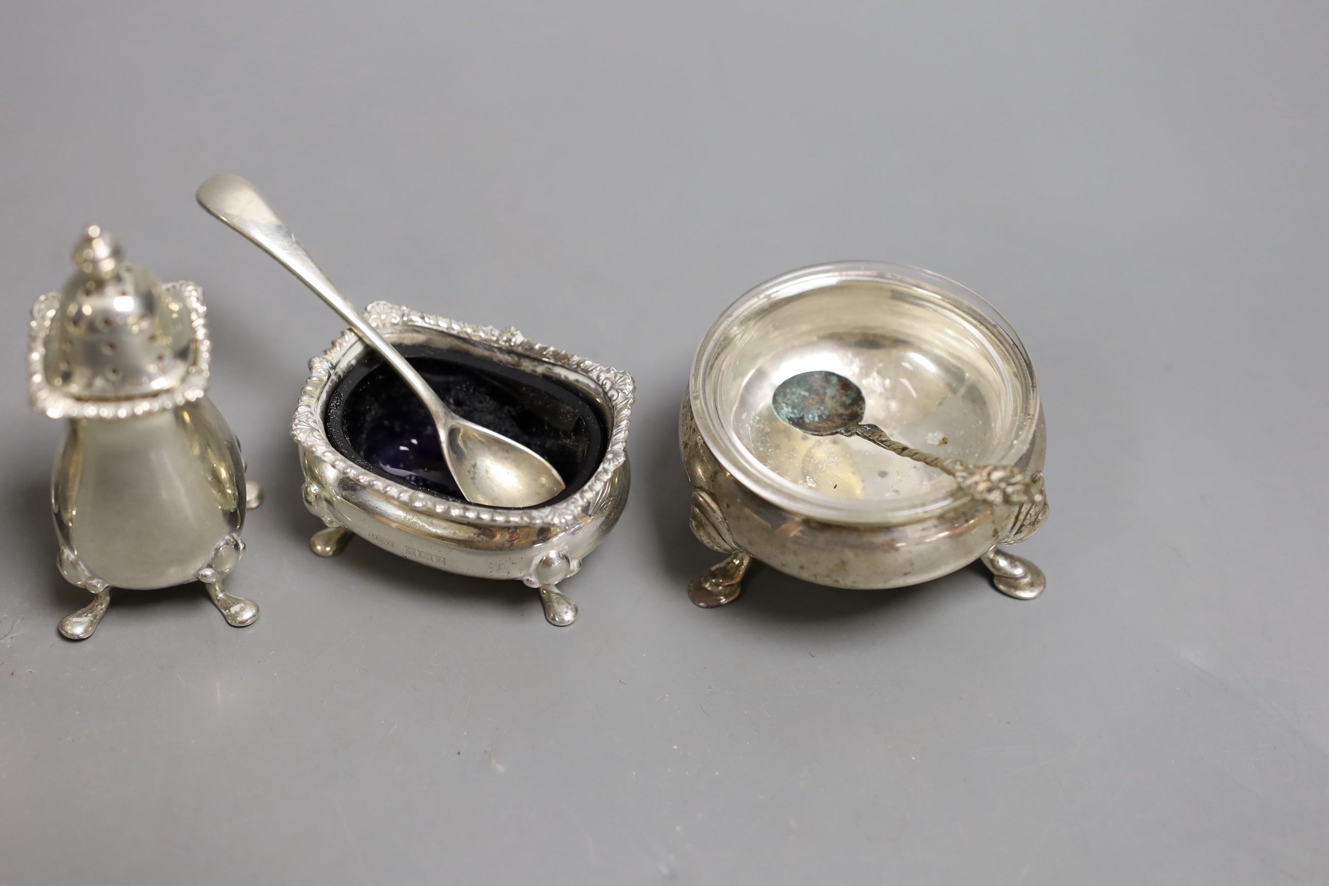 Seven assorted 20th century silver condiments including pepperettes and mustards.